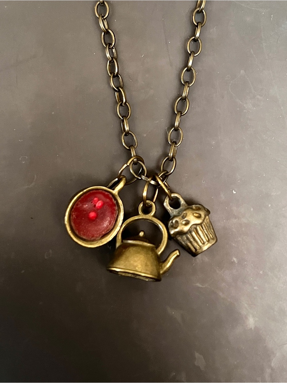 Whimsical brass tea themed necklace